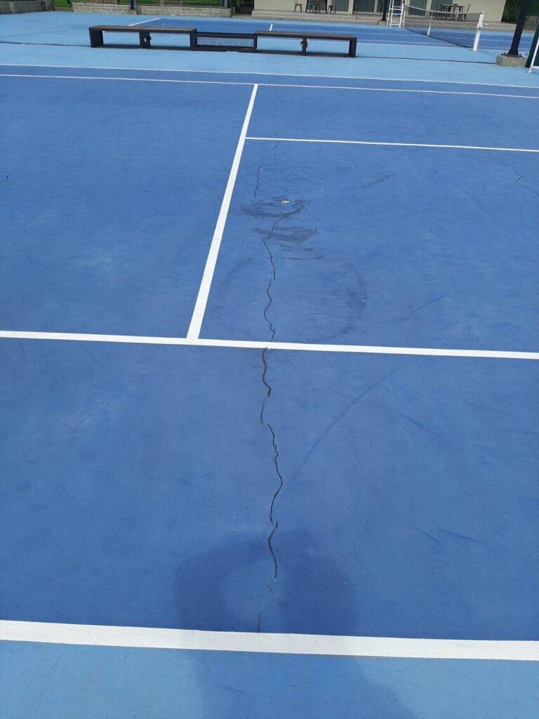 RENOVASI LAPANGAN TENIS